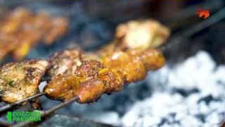 Chicken BBQ skewers on the grill from the Discover Pakistan visit